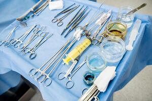 Steralized surgery instruments and devices on the table. photo
