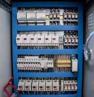 Voltage switchboard with circuit breakers. Modern electrical background photo