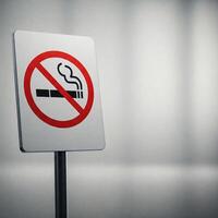 No smoking sign on a metal pole photo