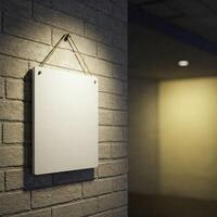 Empty sign hanging on brick wall at night photo