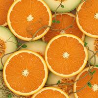 Citrus and Melon Slices, Vines, Top View photo