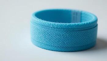 Close-up of Turquoise Fabric Band on White Background for Textile Use photo