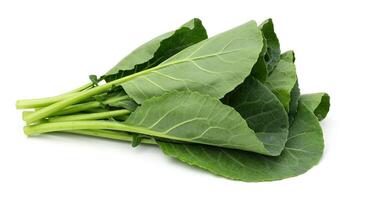 Fresh Collard Greens Bunch on White Background for Cooking or Eating photo