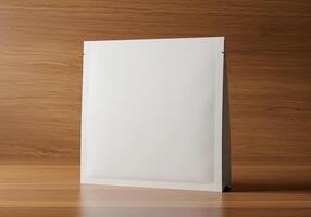 Displaying Blank White Pouch Bag Mockup on Wooden Table for Branding photo