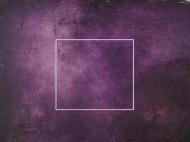 Gritty grunge purple texture background with vignette and aged appearance photo