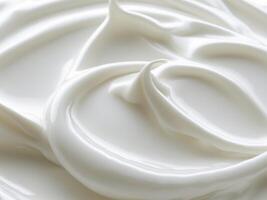 An abstract view of a smooth textured white cream surface. photo