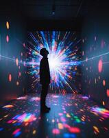 A man standing in front of a colorful light show photo