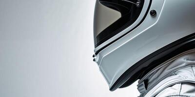 Futuristic White Racing Helmet and Suit Closeup photo