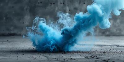 Blue smoke bursting onto concrete surfaces makes for intriguing creative backgrounds photo