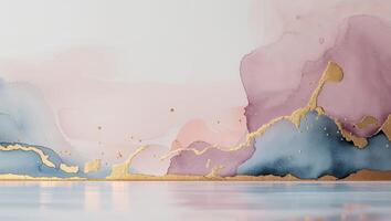 Abstract watercolor background featuring gold and multiple soft color hues. photo