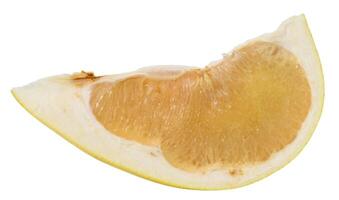 A fresh, juicy slice of pomelo fruit with visible pulp and peel. Citrus fruit section on isolated background. photo