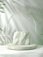 A white rock on a white stand with palm trees photo