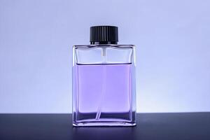 A purple bottle of perfume sitting on a table photo