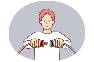Man holding two cords with high voltage wish to connect wires to start electrical equipment vector