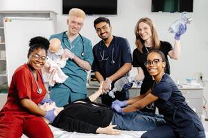 Paramedics practicing cpr on dummy during medical training. photo