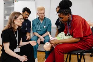 Medical Students Learning Infant CPR during Training Session. photo