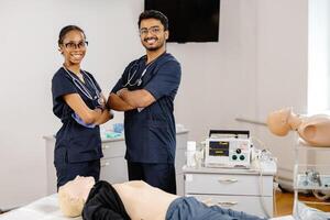 Generated imageMedical Students Practicing CPR Training with Defibrillator and Mannequin photo