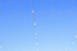 Sunshine and Strings A Beautiful Sky with Decorative Lights That Captivate the Eye photo