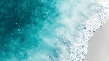An aerial view of the ocean and waves photo