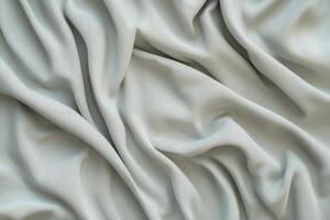 Draped Light Grey Fabric Showing Texture and Waves photo