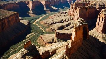 A breathtaking aerial view of a canyon landscape with a winding river below. photo