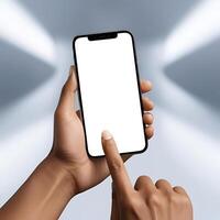 Hand Holding Modern Smartphone with Blank Display photo