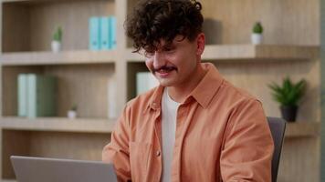 Office computer work business man Caucasian guy happy businessman entrepreneur male employer manager trader programmer using pc browsing search data internet laptop e-commerce online studying smiling video
