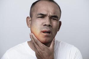 The man has facial swelling due to an allergic reaction to triggers such as insect bites stings.8 photo