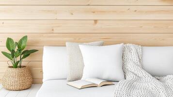 cozy corner with soft throw, pillows, and book inviting relaxation photo