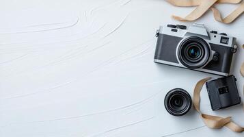 Vintage camera with lens and strap on textured surface photo