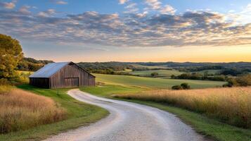 serene countryside scene featuring rustic barn and winding road photo