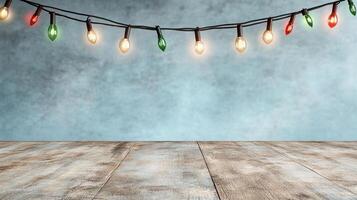 Bright holiday lights hanging over rustic wooden table create festive atmosphere photo