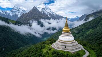A pagoda sits on top of a mountain with clouds in the background photo