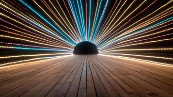 A long tunnel with light beams coming out of it photo