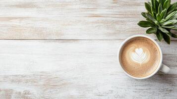 Coffee with heart on white wooden table photo