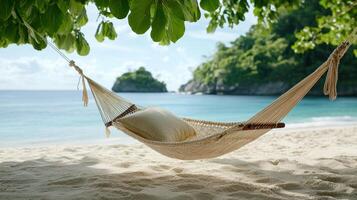 tranquil beach scene featuring hammock swaying gently in breeze photo