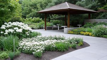 tranquil garden featuring gazebo surrounded by blooming flowers and greenery photo