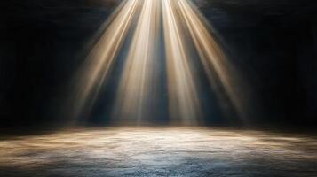 A light beam coming from the ceiling of a dark room photo