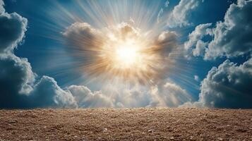 A field with sun shining through clouds photo