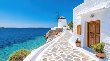 Greek island of mykonos, greece - beautiful white buildings and blue sea photo