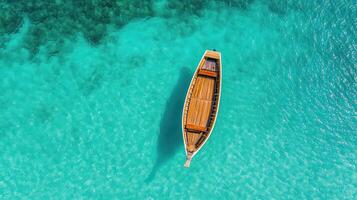 A boat floating in the ocean photo