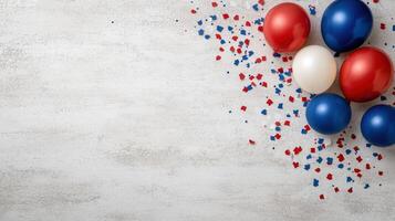 Red, white and blue balloons on a concrete background photo