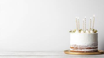 A white cake with candles on top photo