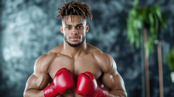A man with dreadlocks and boxing gloves photo