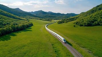 A train traveling through a green valley photo