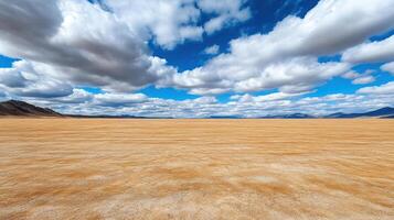 A desert with a blue sky and clouds photo