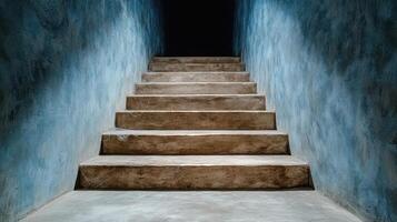 Narrow staircase leading down into darkness, evoking mystery and intrigue photo