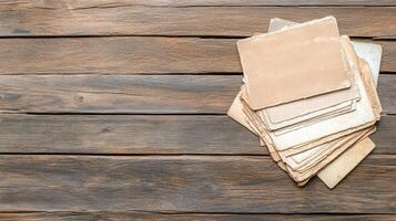 Old papers on wooden table photo