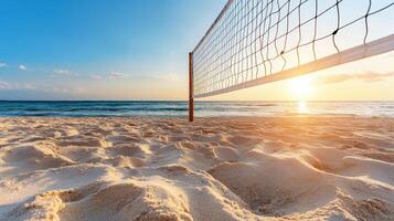 A volleyball net on the beach at sunset photo