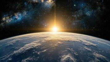 The earth and the sun rising over it photo